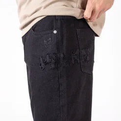 WLKN : Distressed Logo Loose Fit Denim Pants